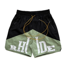 Rhude Contrasting color patchwork shorts