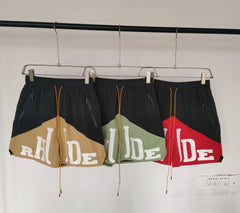 Rhude Contrasting color patchwork shorts