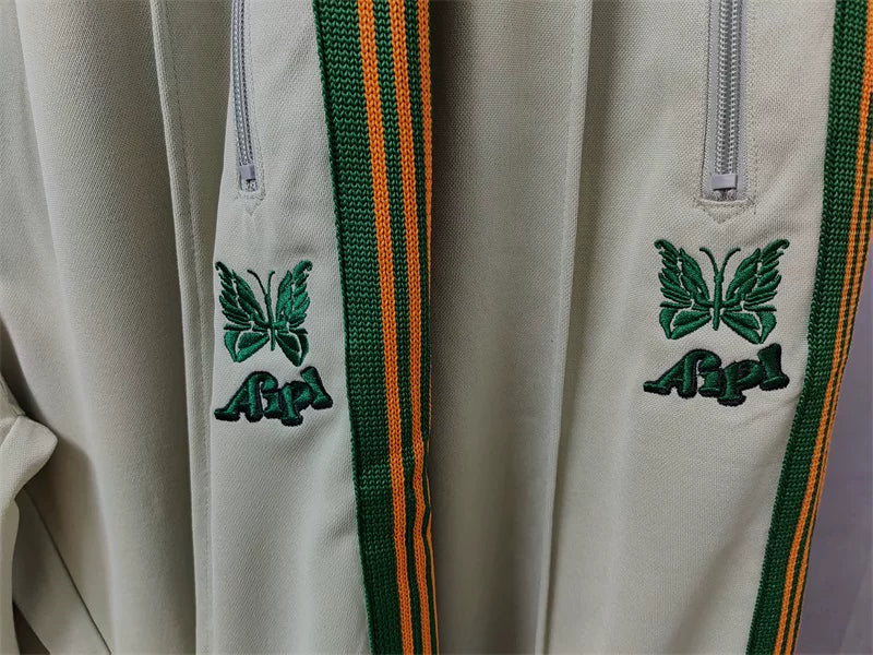 Needles x Aip Butterfly Embroidered Stripe Track Pants