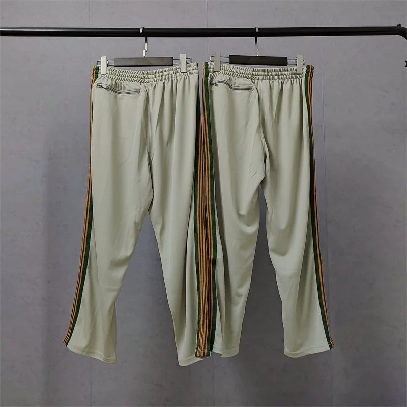 Needles x Aip Butterfly Embroidered Stripe Track Pants