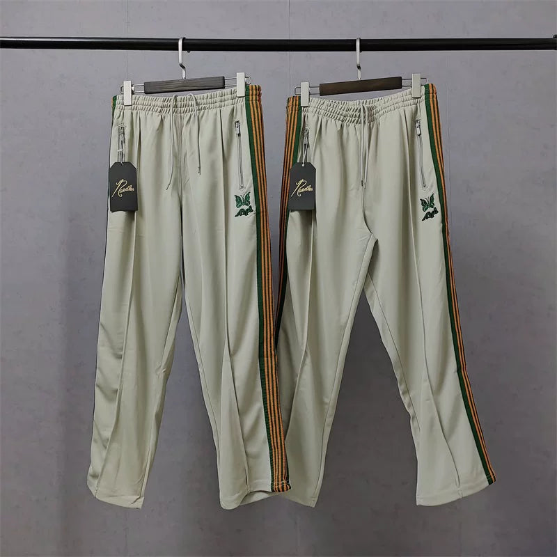 Needles x Aip Butterfly Embroidered Stripe Track Pants