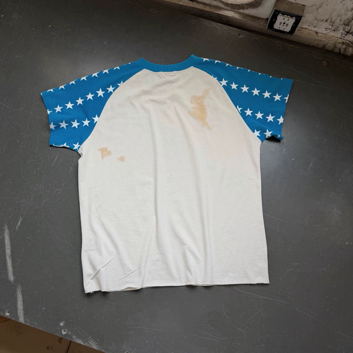 ERD's melancholic Distressed Star Raglan Graphic Tee