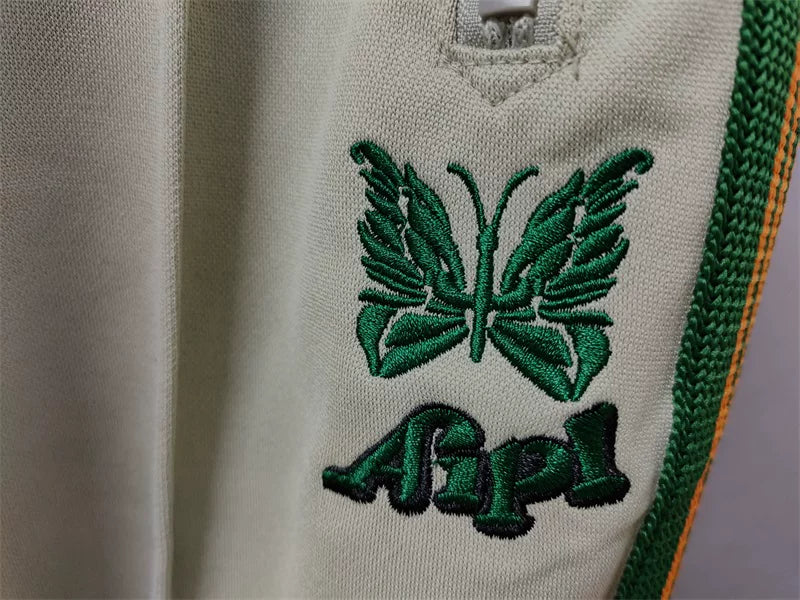 Needles x Aip Butterfly Embroidered Stripe Track Pants