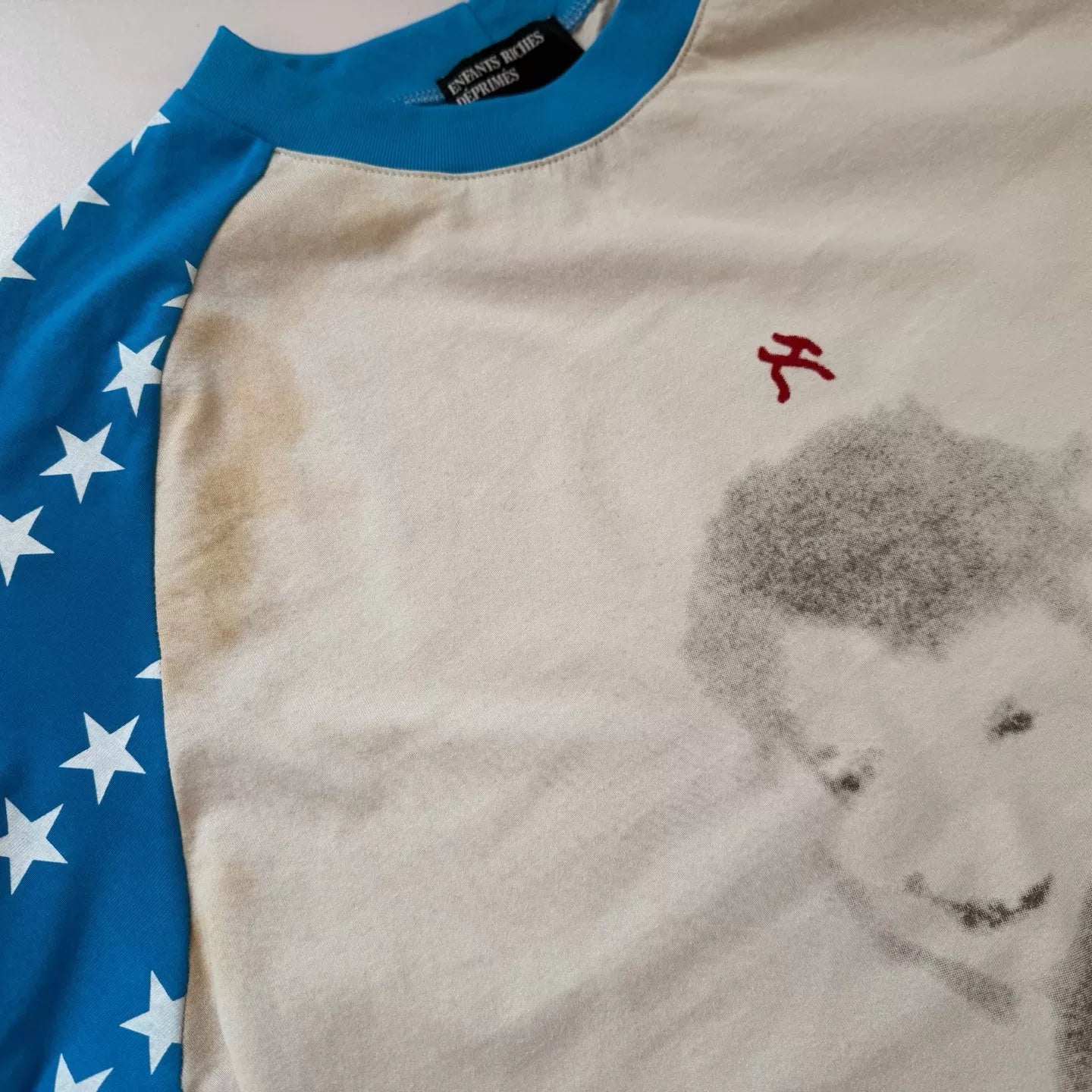 ERD's melancholic Distressed Star Raglan Graphic Tee